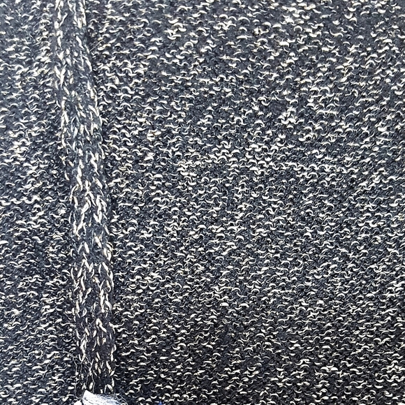 Shimmering Golden Black Sleeveless Mock Neck Knit Top| Reitman - Picture 4 of 4